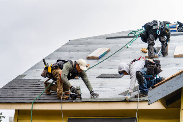 Professional Gutter Installation technician working in Vaughn, WA